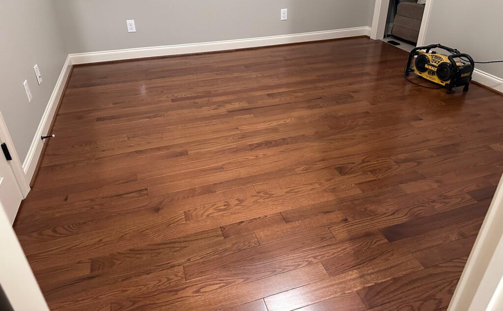 prefinished hardwood floor in bedroom